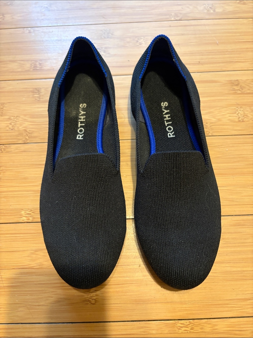 Rothy's Black Slip-On Loafers with Blue Trim
